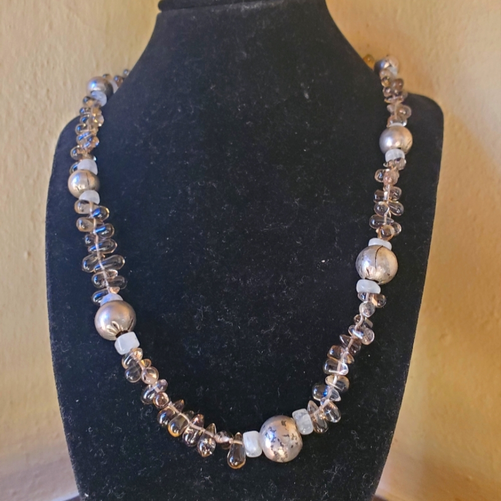 Amethyst (tested) and silver hollow beads make for a lovely necklace!